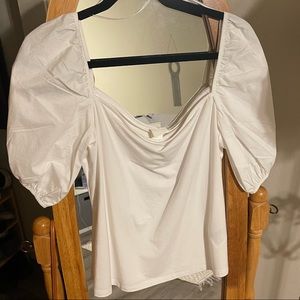 White puffy sleep top
